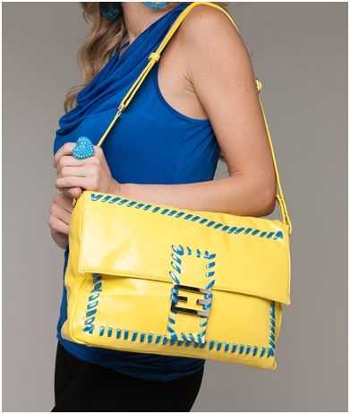 yellow and blue stitched handbag